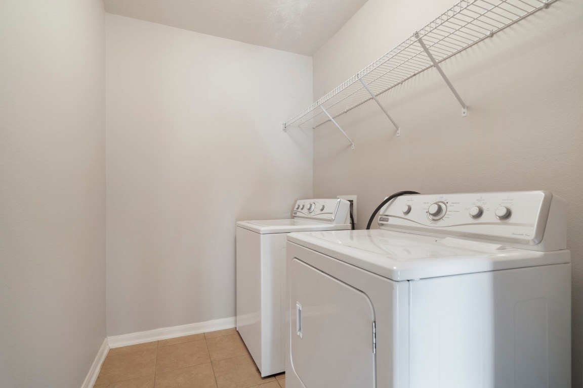 615 Timberstand Lane Spring, TX 77373 - Photo 17 of 19 Discover convenience in this spacious laundry room, ready for your personal touch with your own washer and dryer! (washer and dryer in photo not included)