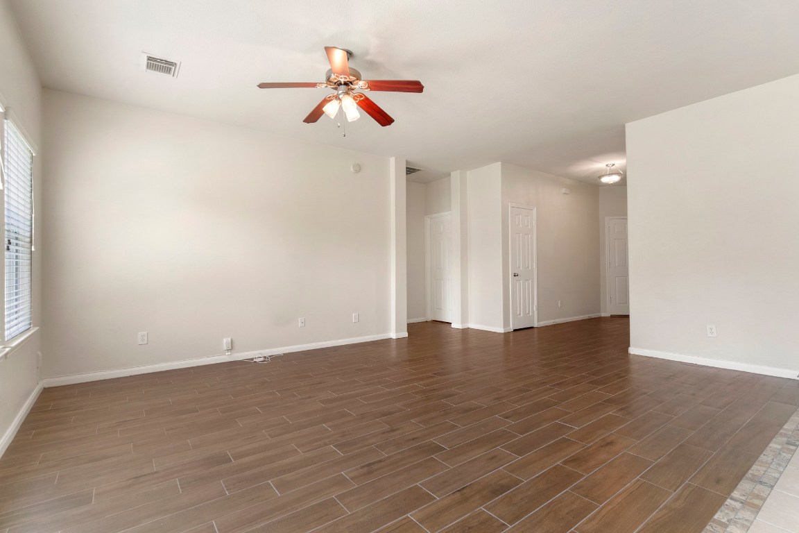 615 Timberstand Lane Spring, TX 77373 - Photo 4 of 19 Experience the inviting warmth and openness of this spacious family room, perfect for creating cherished memories.