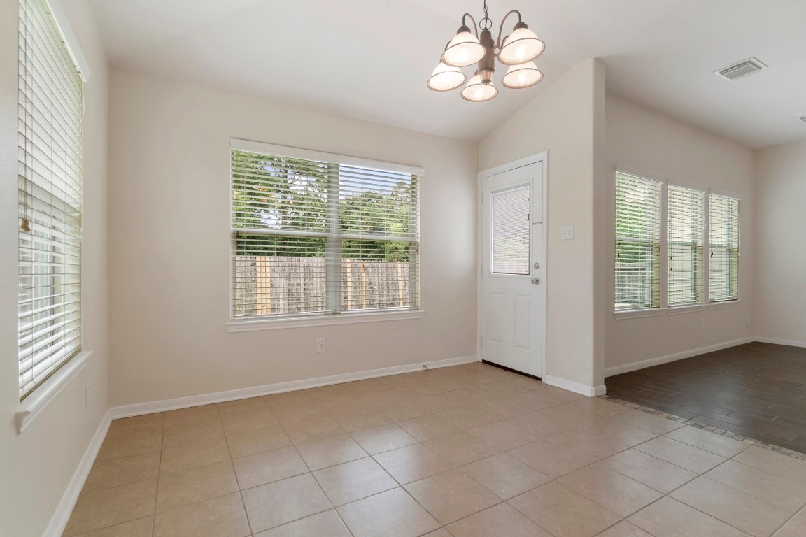 615 Timberstand Lane Spring, TX 77373 - Photo 5 of 19 This bright and inviting breakfast room features large windows that flood the space with natural light, creating the perfect cozy spot for morning coffee and family gatherings.