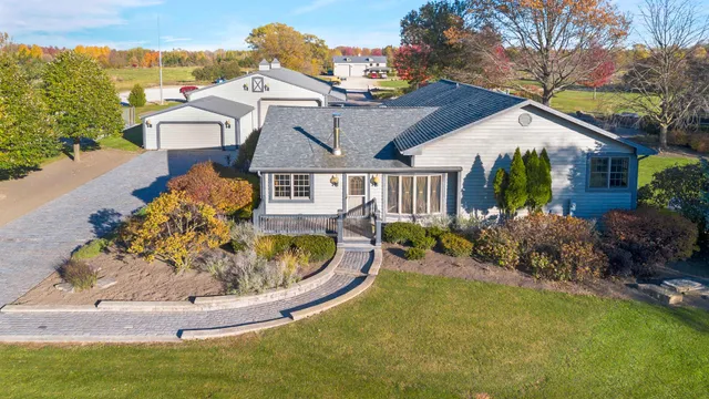 a view of a house with a yard balcony