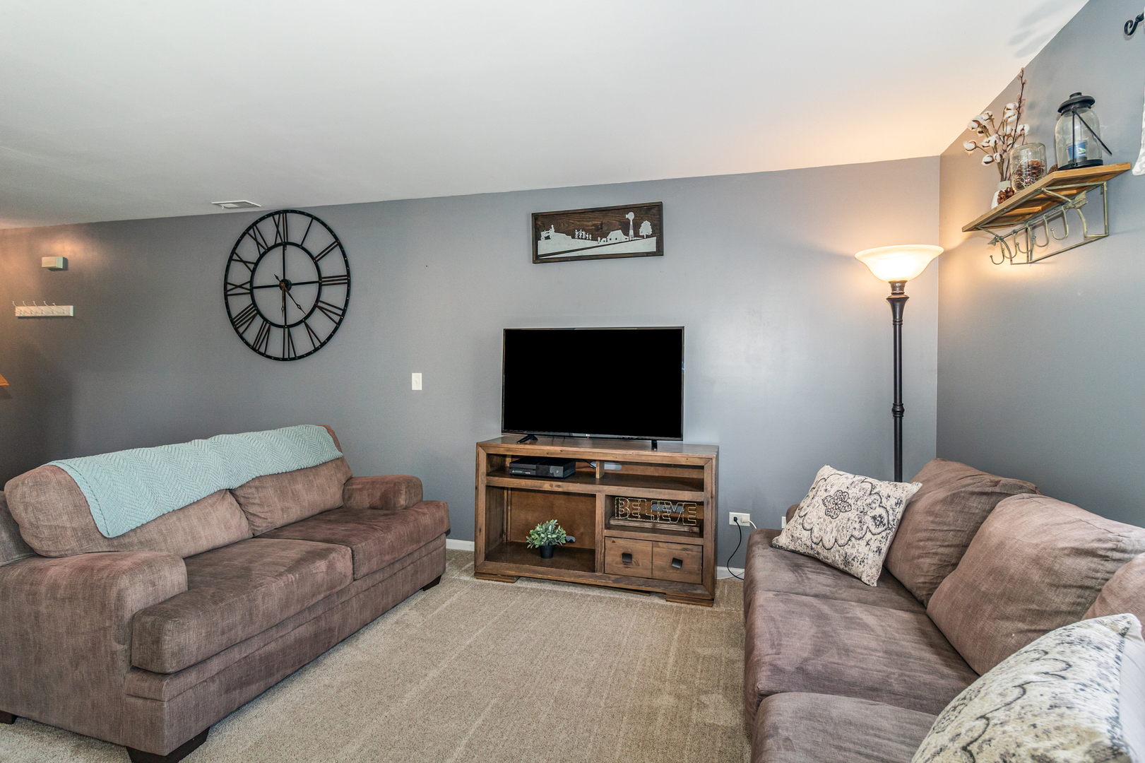 25151 Faraday Road Manhattan, IL 60442 - Photo 2 of 13 a living room with furniture and a flat screen tv