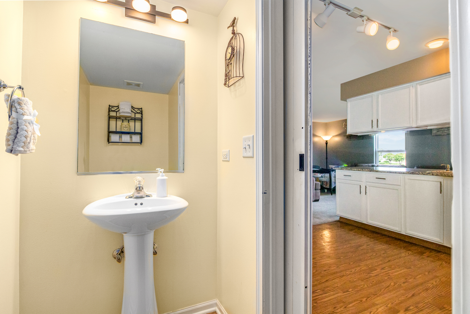 25151 Faraday Road Manhattan, IL 60442 - Photo 5 of 13 a kitchen with a sink a refrigerator and cabinets