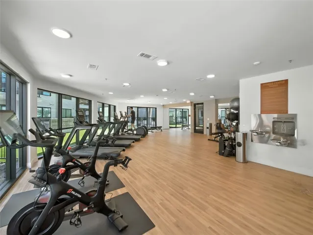 a view of a kitchen with a large window