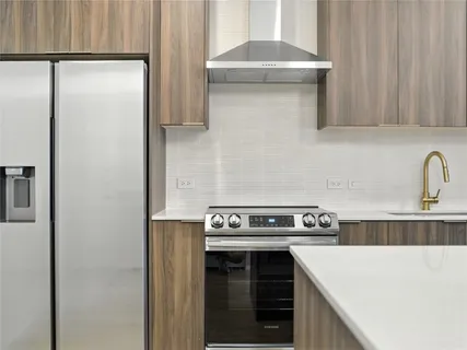 a view of a lake with a city skyline in the background