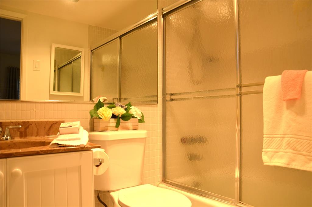 255 South Cypress Road, Unit 342 Pompano Beach, FL 33060 - Photo 11 of 23 a bathroom with a sink toilet and shower