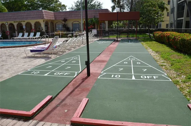 a view of a yard with a patio