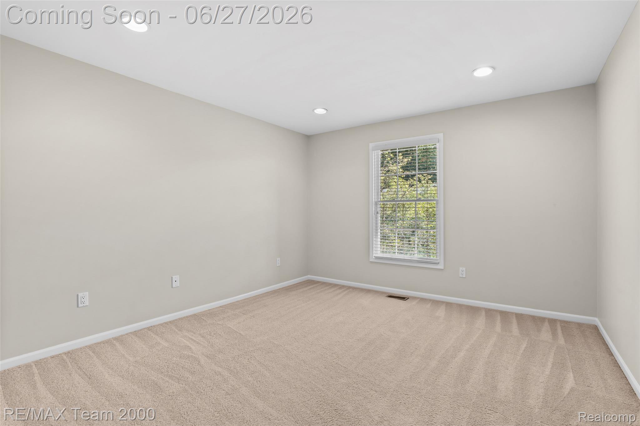 1248 Lasalle Road Canton, MI 48187 - Photo 45 of 67 Neutral-toned room featuring a single window with blinds, carpet flooring, recessed lighting, and white baseboards