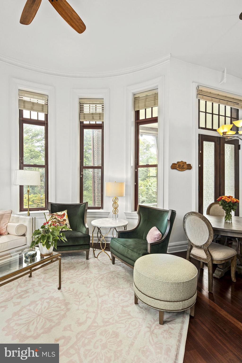 9610 Dewitt Drive, Unit PH204 Silver Spring, MD 20910 - Photo 20 of 42 a living room with furniture and wooden floor