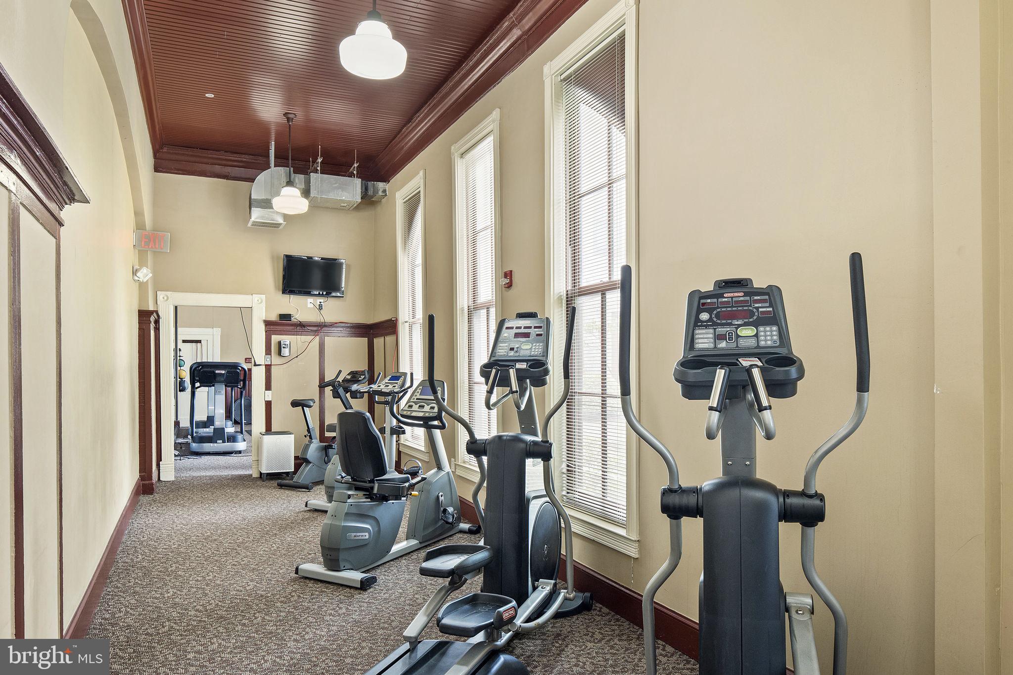 9610 Dewitt Drive, Unit PH204 Silver Spring, MD 20910 - Photo 40 of 42 a view of a room with gym equipment