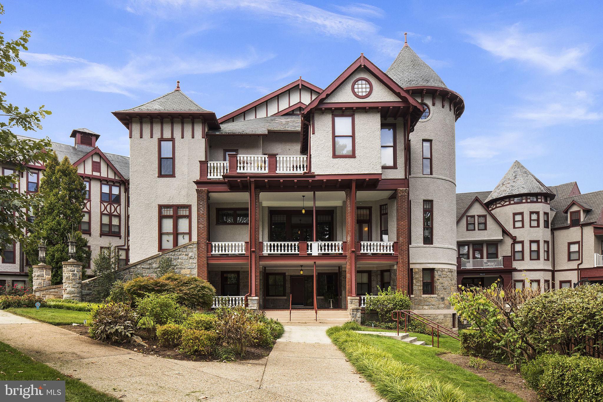 9610 Dewitt Drive, Unit PH204 Silver Spring, MD 20910 - Photo 42 of 42 a front view of a house with a yard