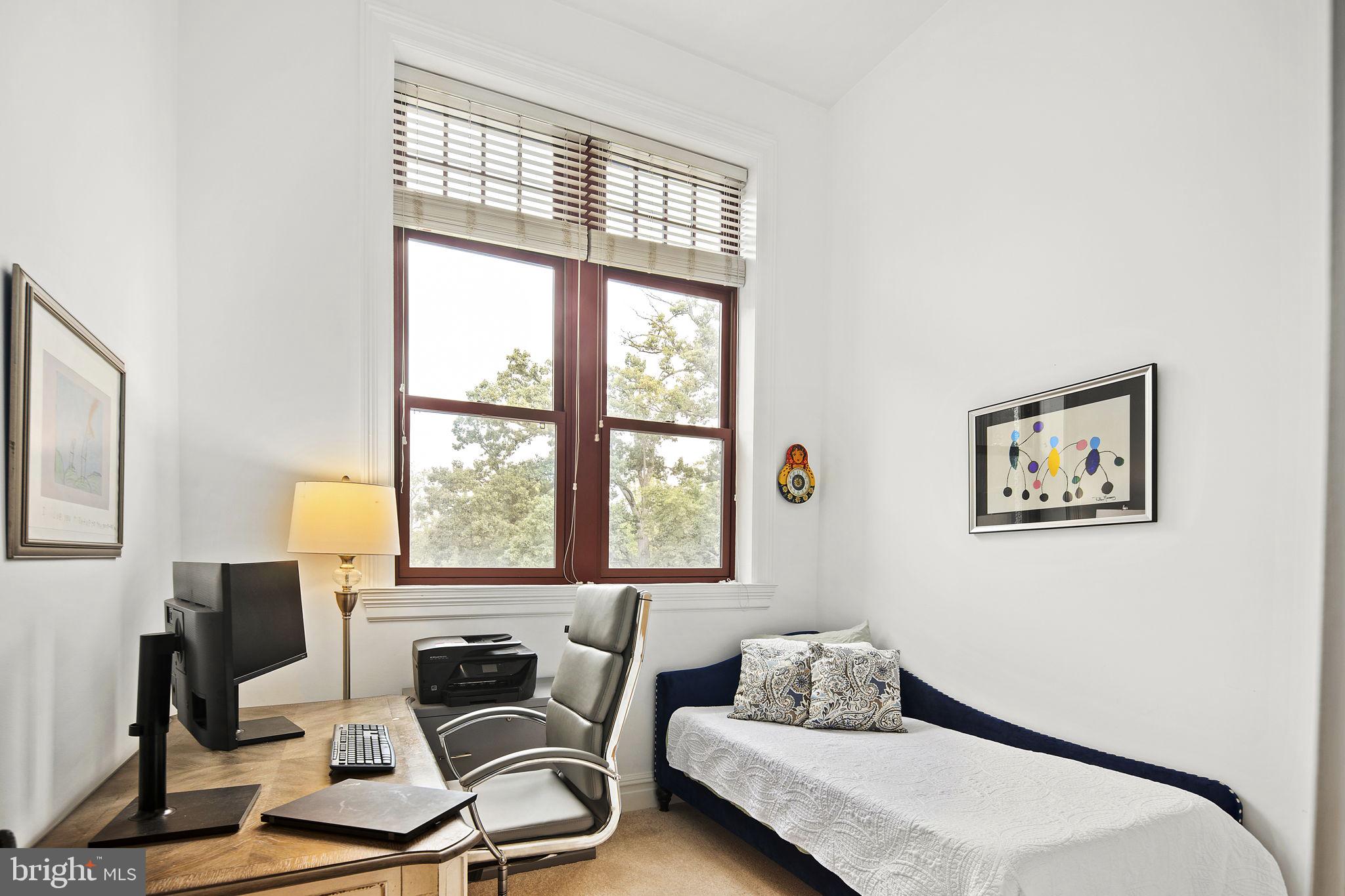 9610 Dewitt Drive, Unit PH204 Silver Spring, MD 20910 - Photo 6 of 42 a work room with furniture and a window