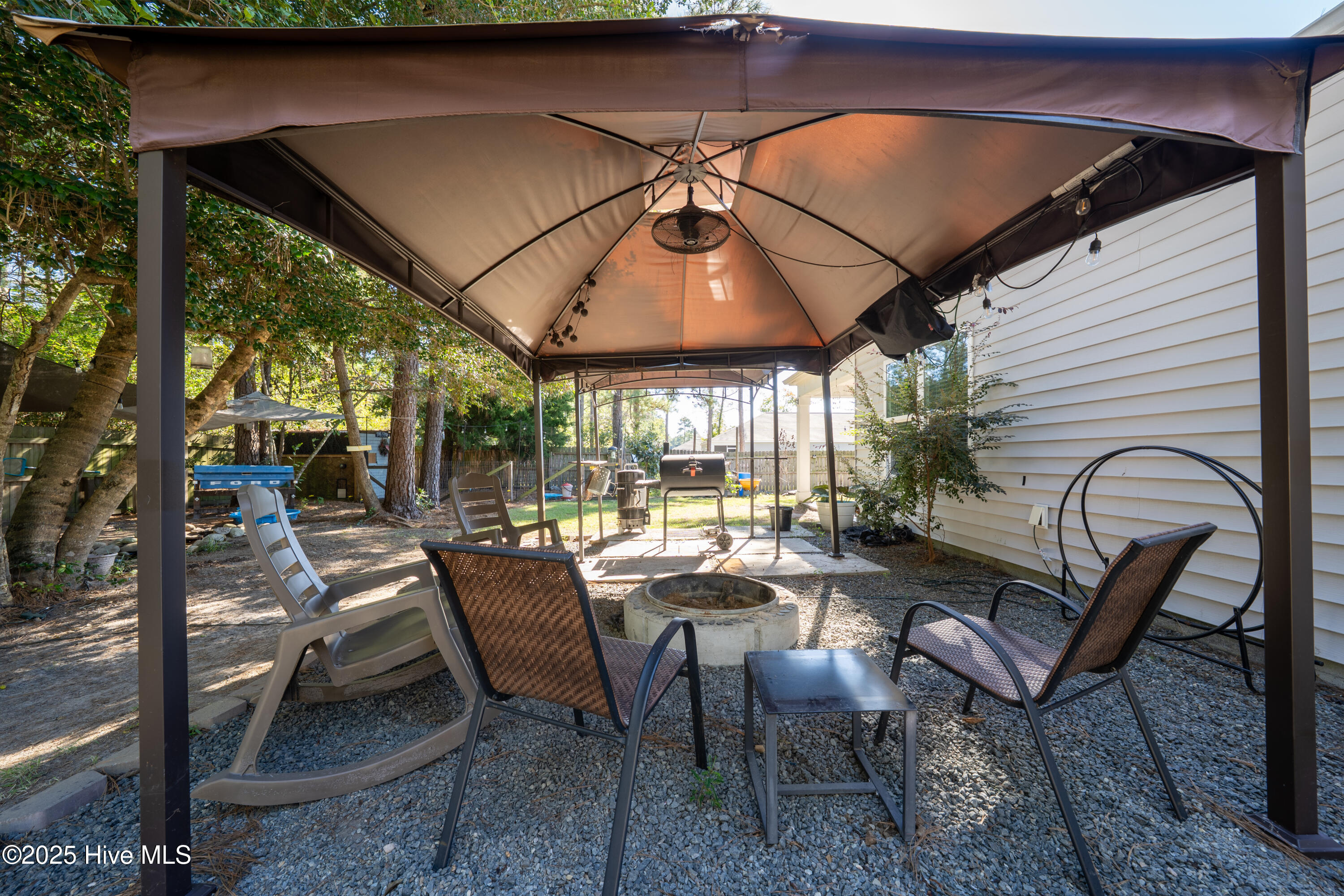 430 Ellis Road Southeast, Unit LOT #55 Bolivia, NC 28422 - Photo 58 of 111 Fire pit & pergola convey
