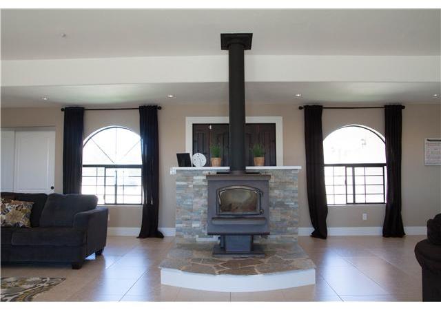 39223 Opalocka Road Boulevard, CA 91905 - Photo 4 of 25 Fireplace, Front Door behind Fireplace