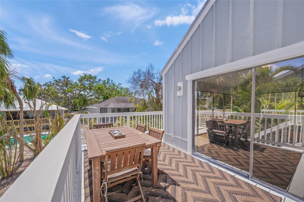 1256 Riegels Landing Drive Sarasota, FL 34242 - Photo 19 of 40 a balcony view with a seating space