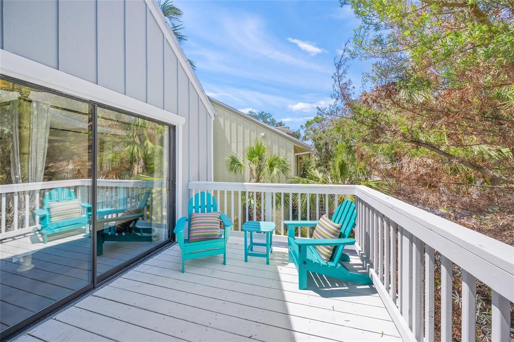 1256 Riegels Landing Drive Sarasota, FL 34242 - Photo 21 of 40 a view of two chairs on the roof deck