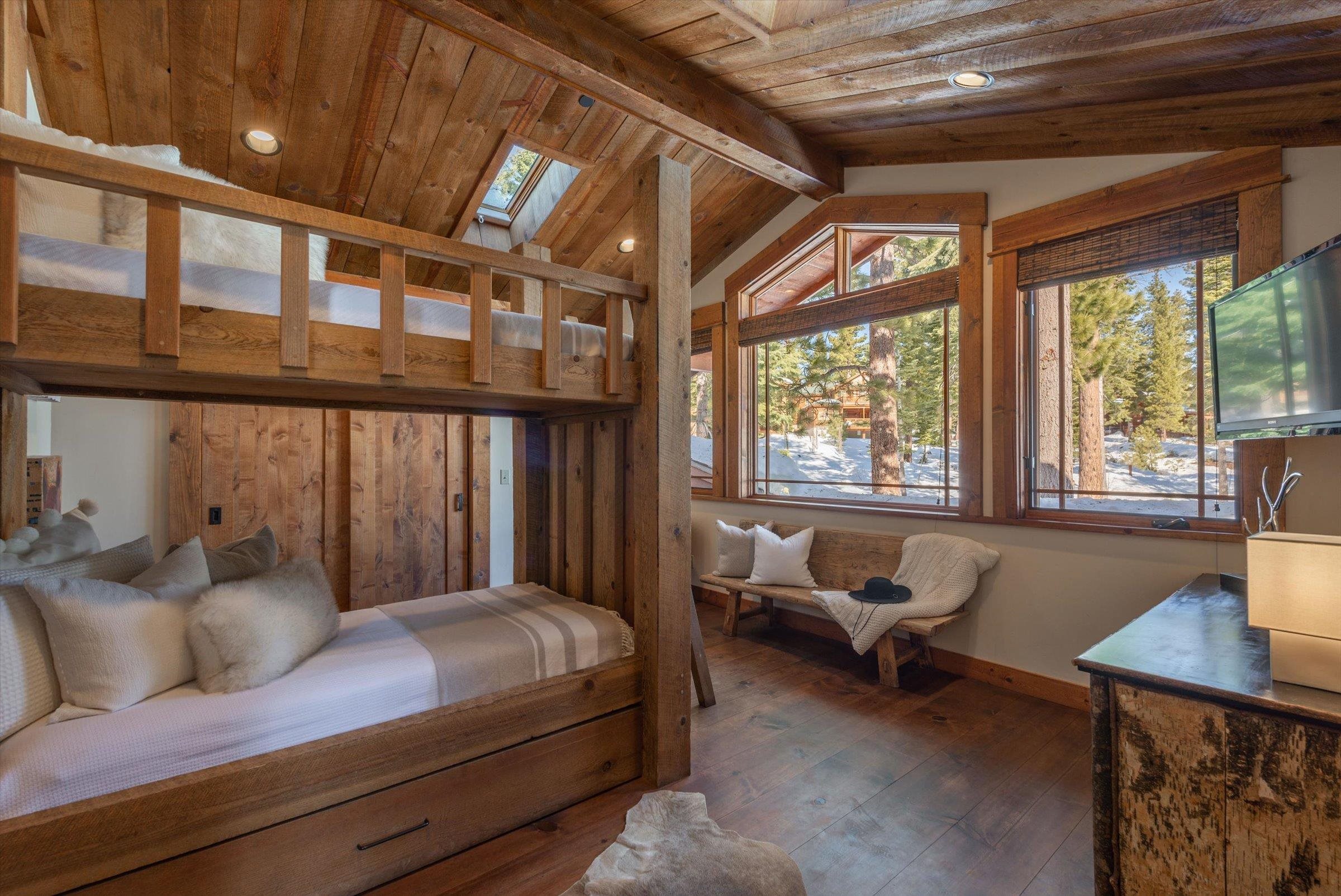 1756 Grouse Ridge Road Truckee, CA 96161 - Photo 16 of 21 a bedroom with furniture and a large window