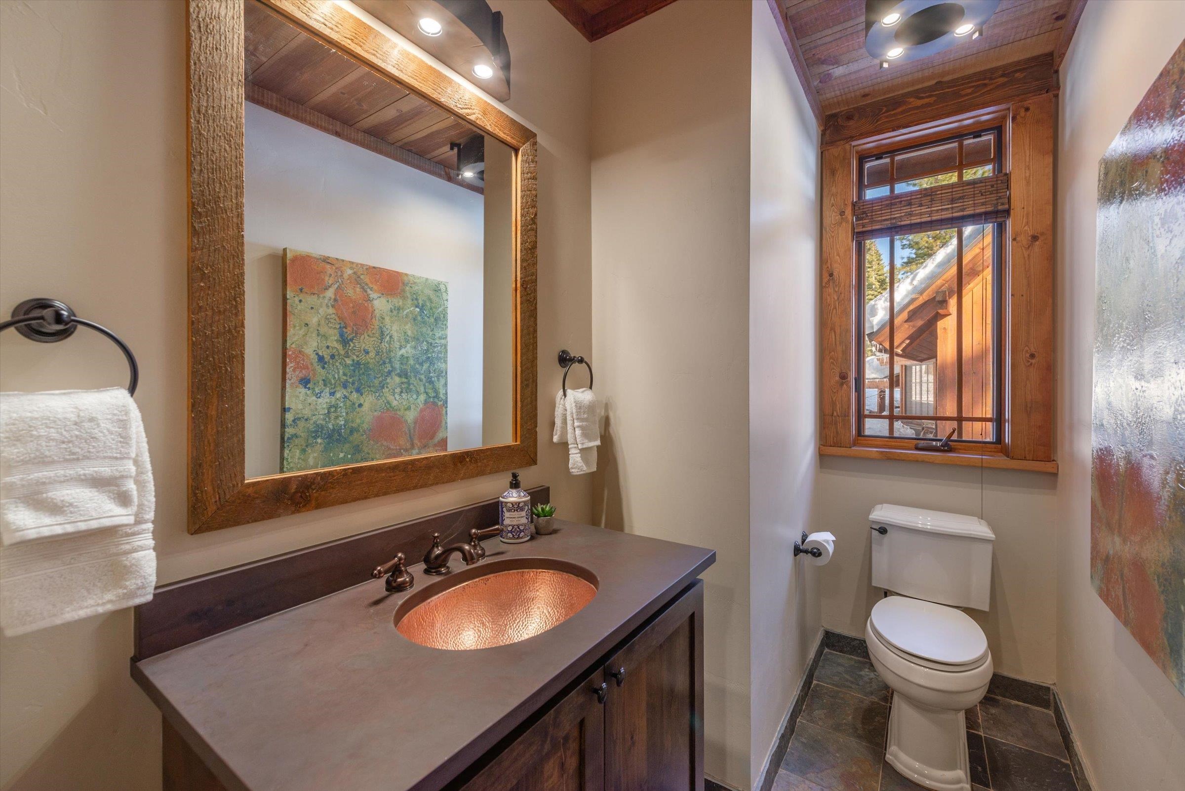 1756 Grouse Ridge Road Truckee, CA 96161 - Photo 20 of 21 a bathroom with a sink vanity mirror and toilet