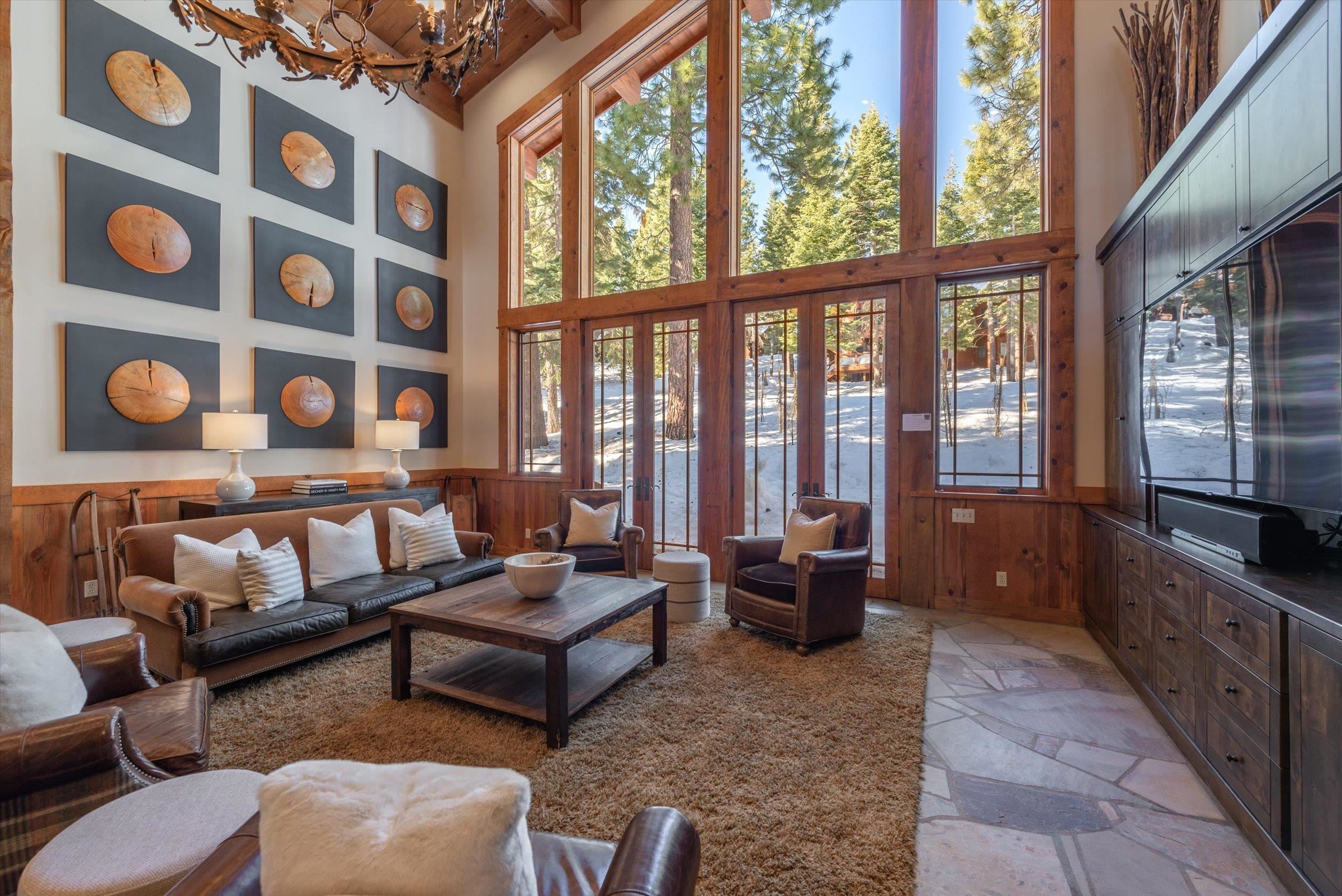 1756 Grouse Ridge Road Truckee, CA 96161 - Photo 4 of 21 a living room with furniture and a floor to ceiling window