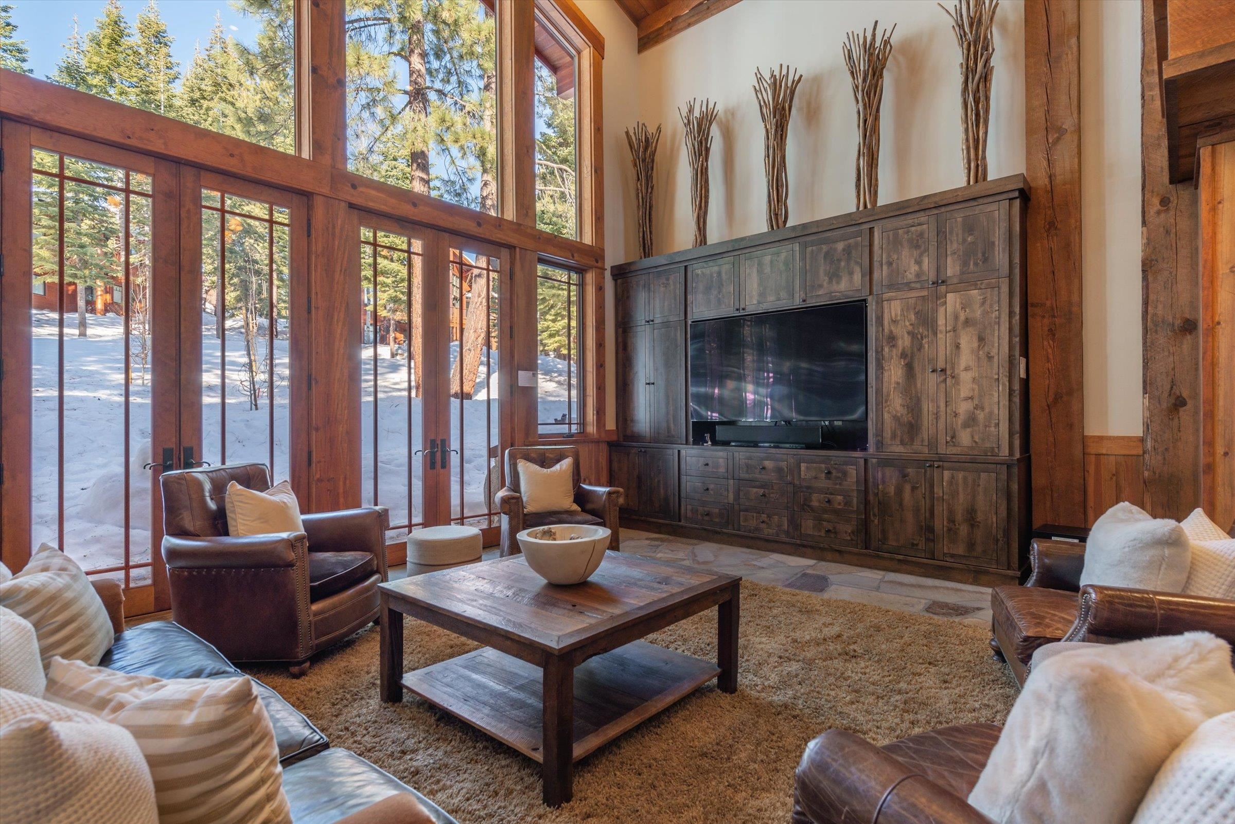 1756 Grouse Ridge Road Truckee, CA 96161 - Photo 5 of 21 a living room with furniture and a floor to ceiling window