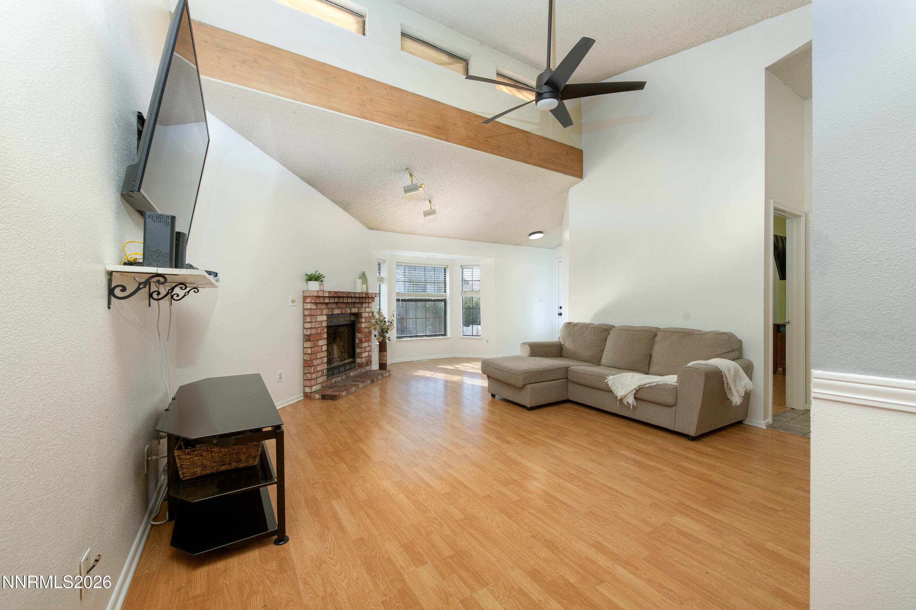 1352 Leonard Road Gardnerville, NV 89460 - Photo 13 of 23 a living room with furniture and a wooden floor