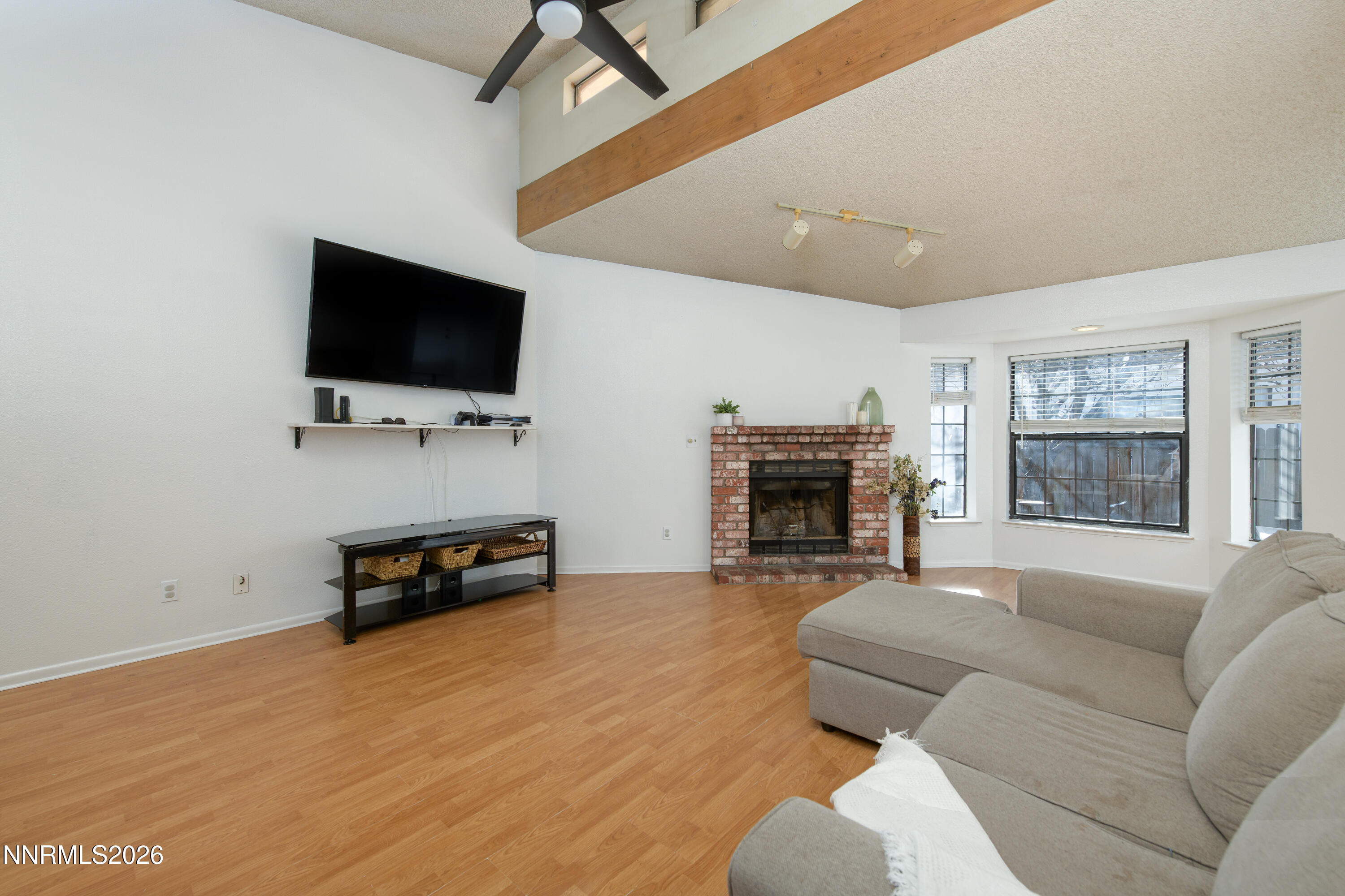 1352 Leonard Road Gardnerville, NV 89460 - Photo 14 of 23 a living room with furniture and a flat screen tv