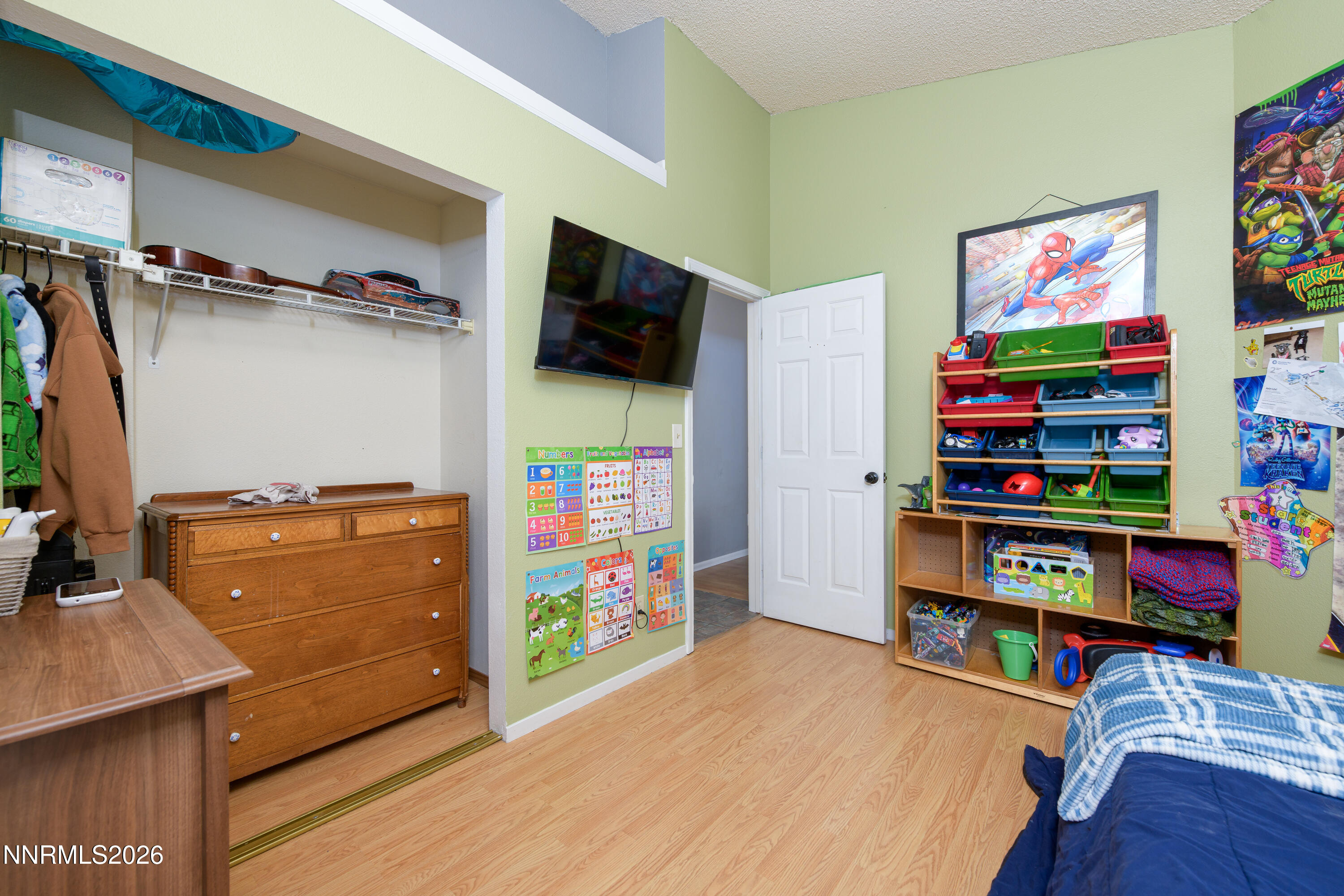 1352 Leonard Road Gardnerville, NV 89460 - Photo 17 of 23 a room with furniture and a flat screen tv
