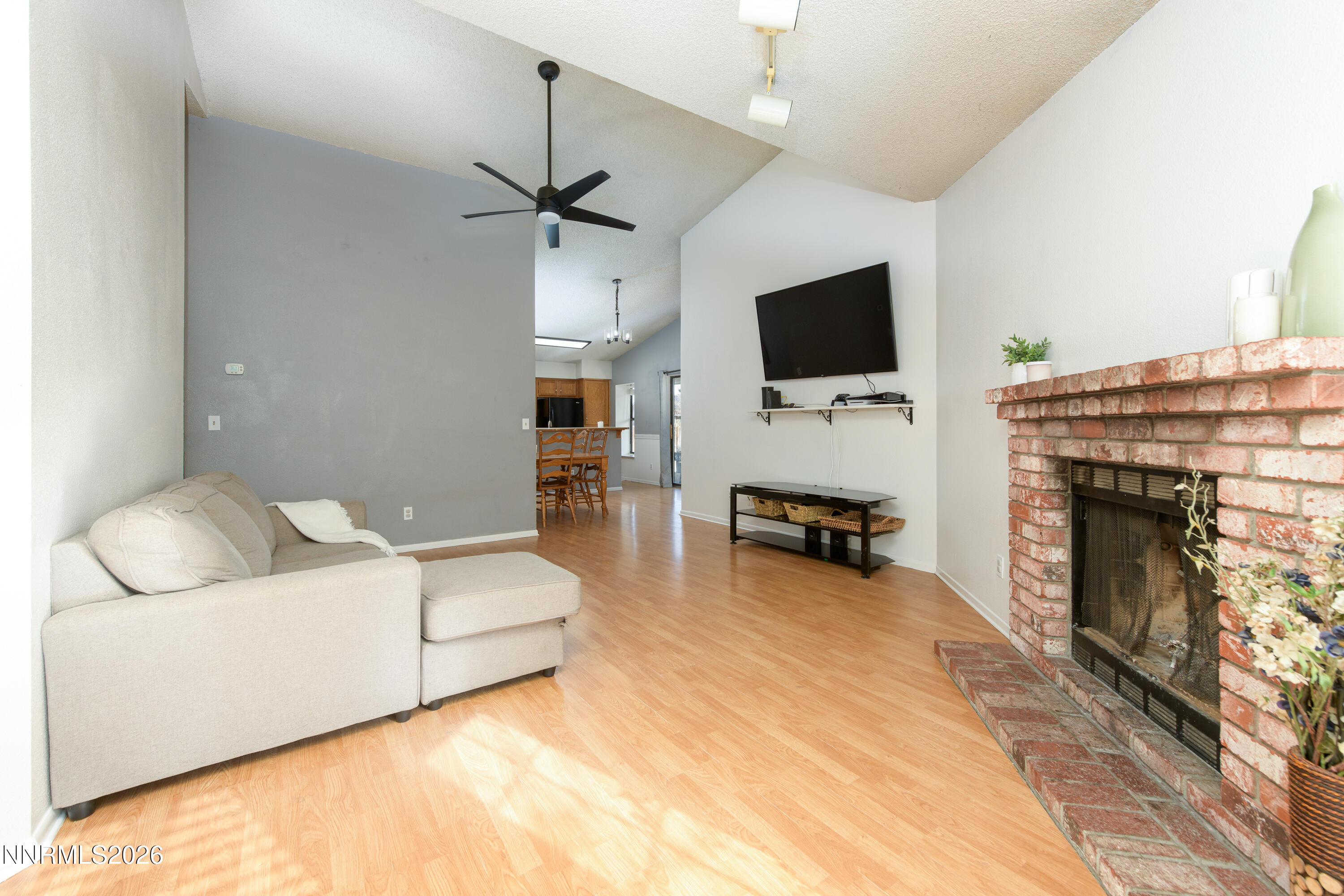 1352 Leonard Road Gardnerville, NV 89460 - Photo 5 of 23 a living room with furniture and a flat screen tv