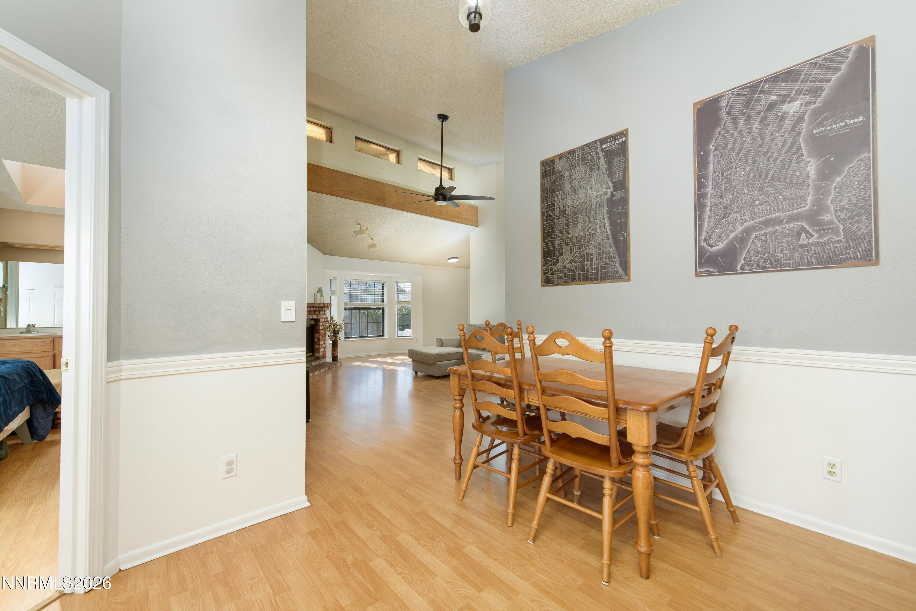 1352 Leonard Road Gardnerville, NV 89460 - Photo 9 of 23 a view of a dining room with furniture and wooden floor