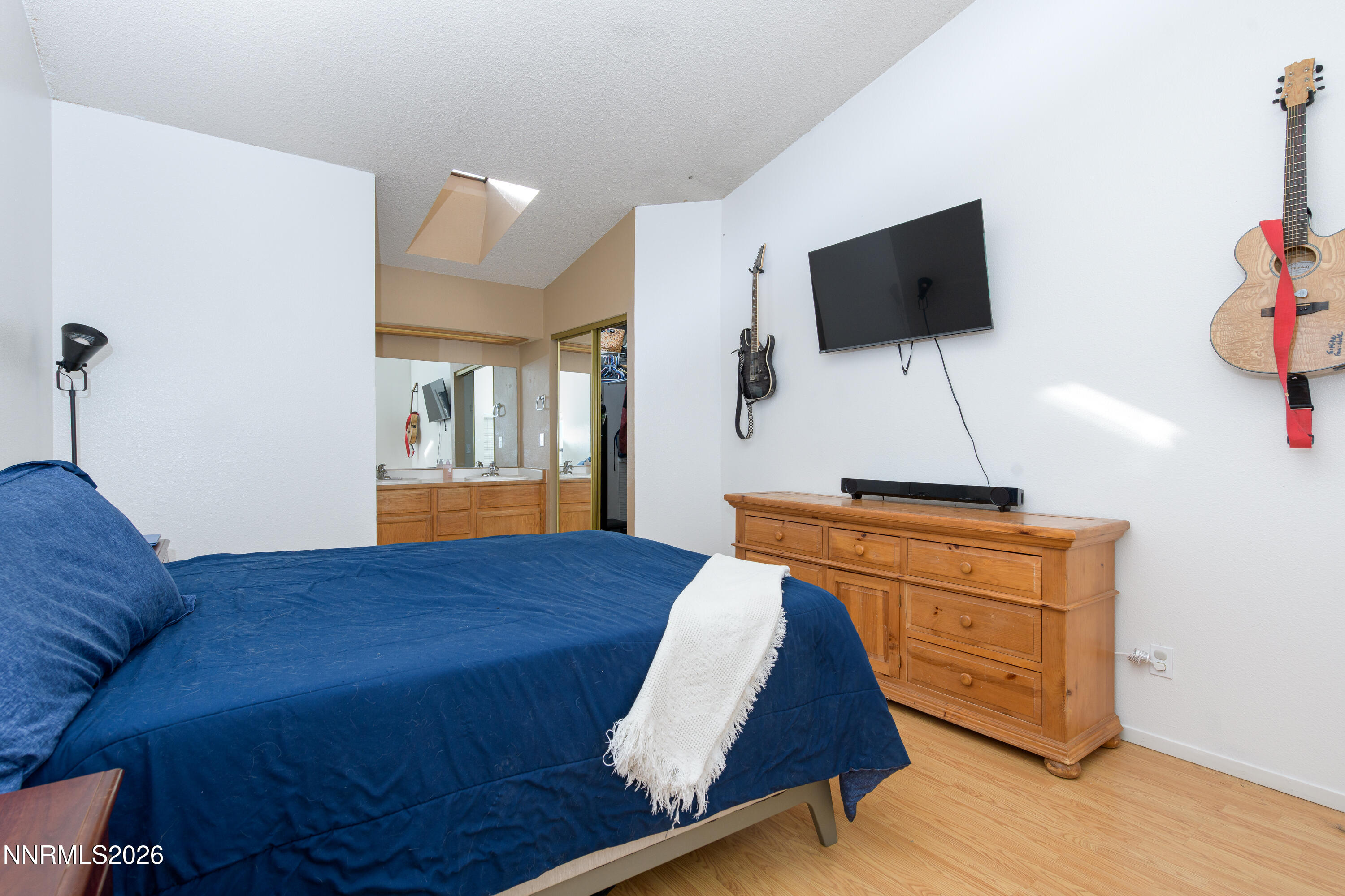 1352 Leonard Road Gardnerville, NV 89460 - Photo 10 of 23 a living room with furniture and a flat screen tv