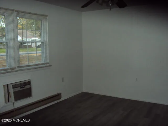 an empty room with a fireplace