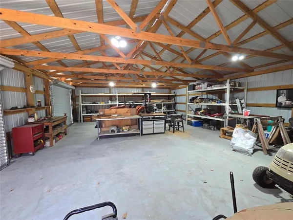 a view of parking room with storage and utility