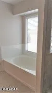 a bathroom with a sink double vanity and a mirror
