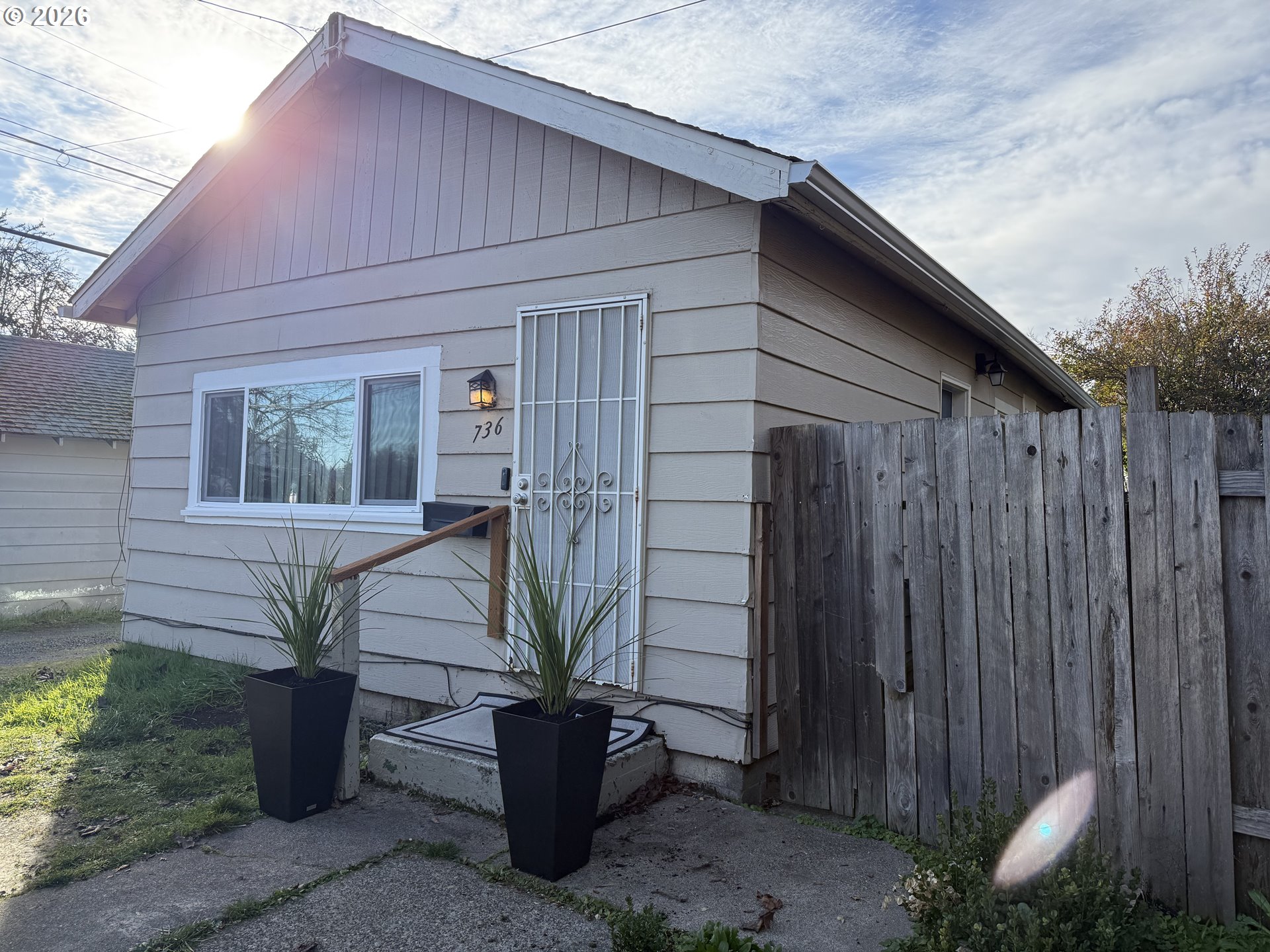 736 5th Street Springfield, OR 97477 - Photo 9 of 9 a front view of a house with garden