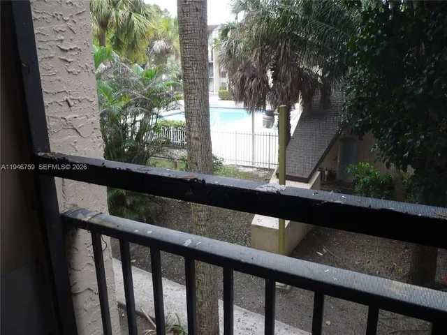 swimming pool view with a outdoor seating