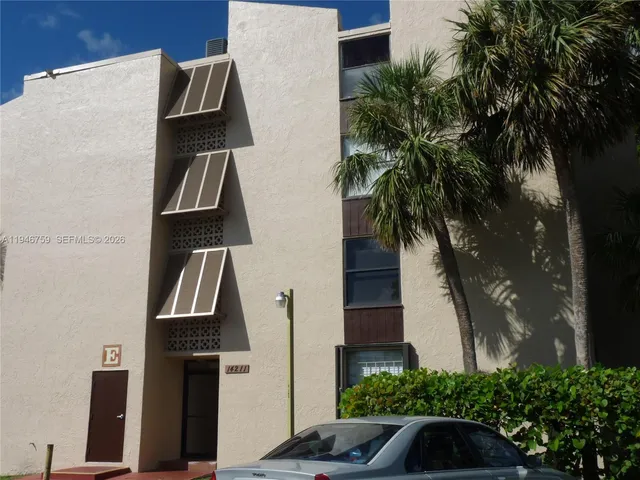a view of swimming pool with a yard