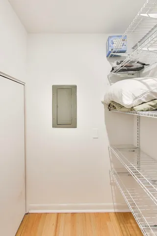 a view of a room with racks on the wall