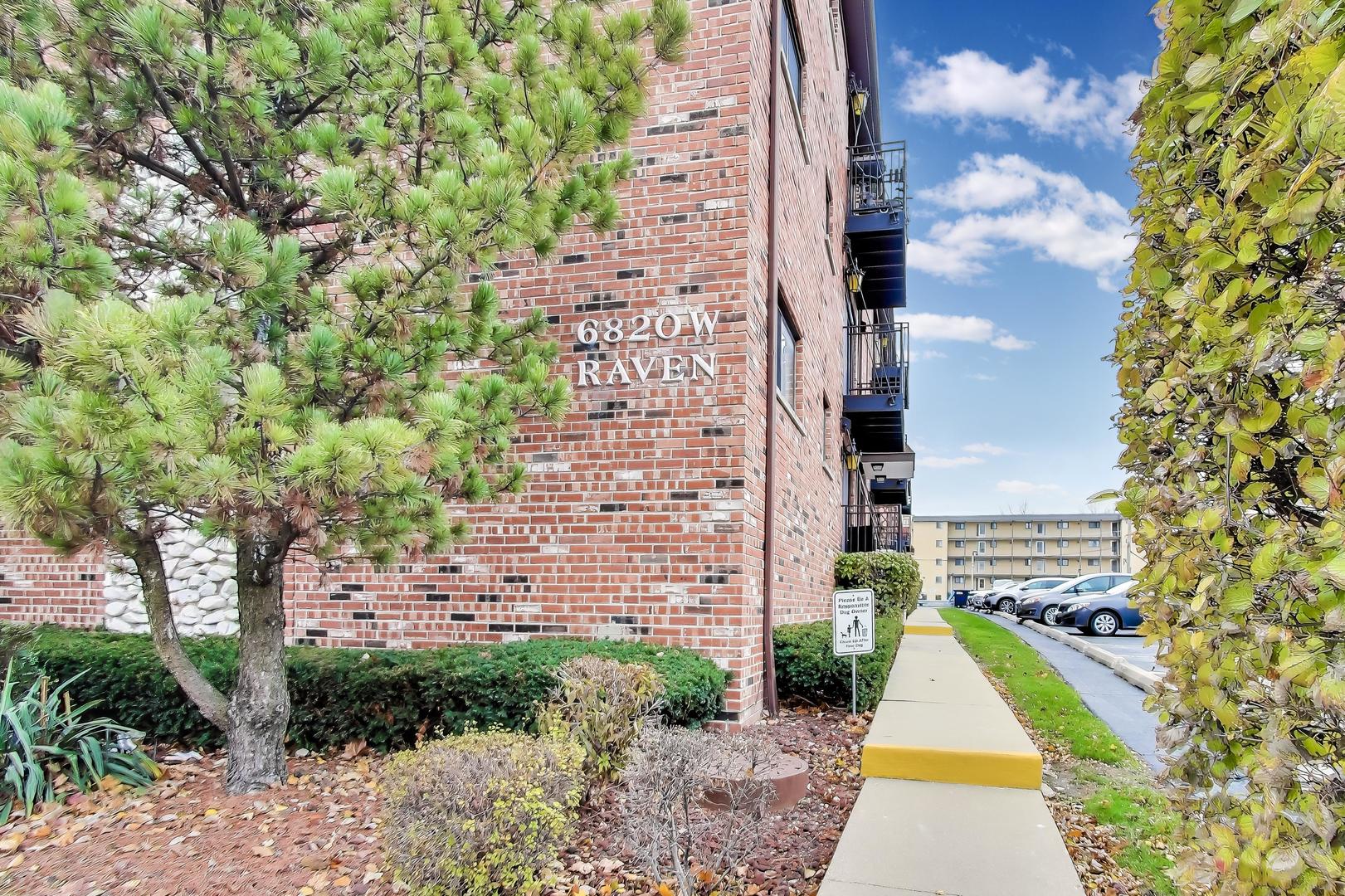 6820 West Raven Street, Unit 1B Chicago, IL 60631 - Photo 2 of 25 a view of swimming pool with a garden