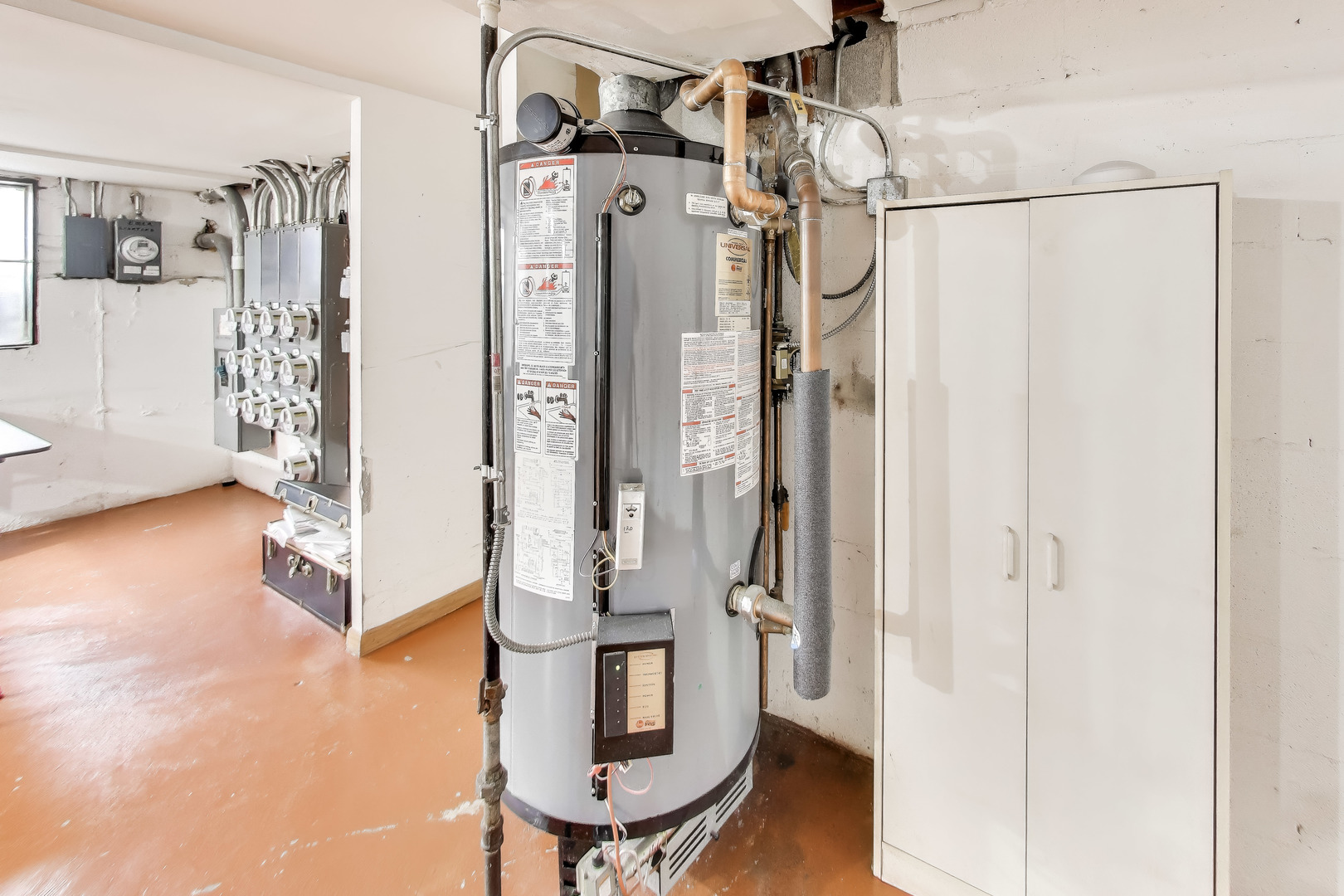 6820 West Raven Street, Unit 1B Chicago, IL 60631 - Photo 23 of 25 a view of walk in closet with clothes and shoes