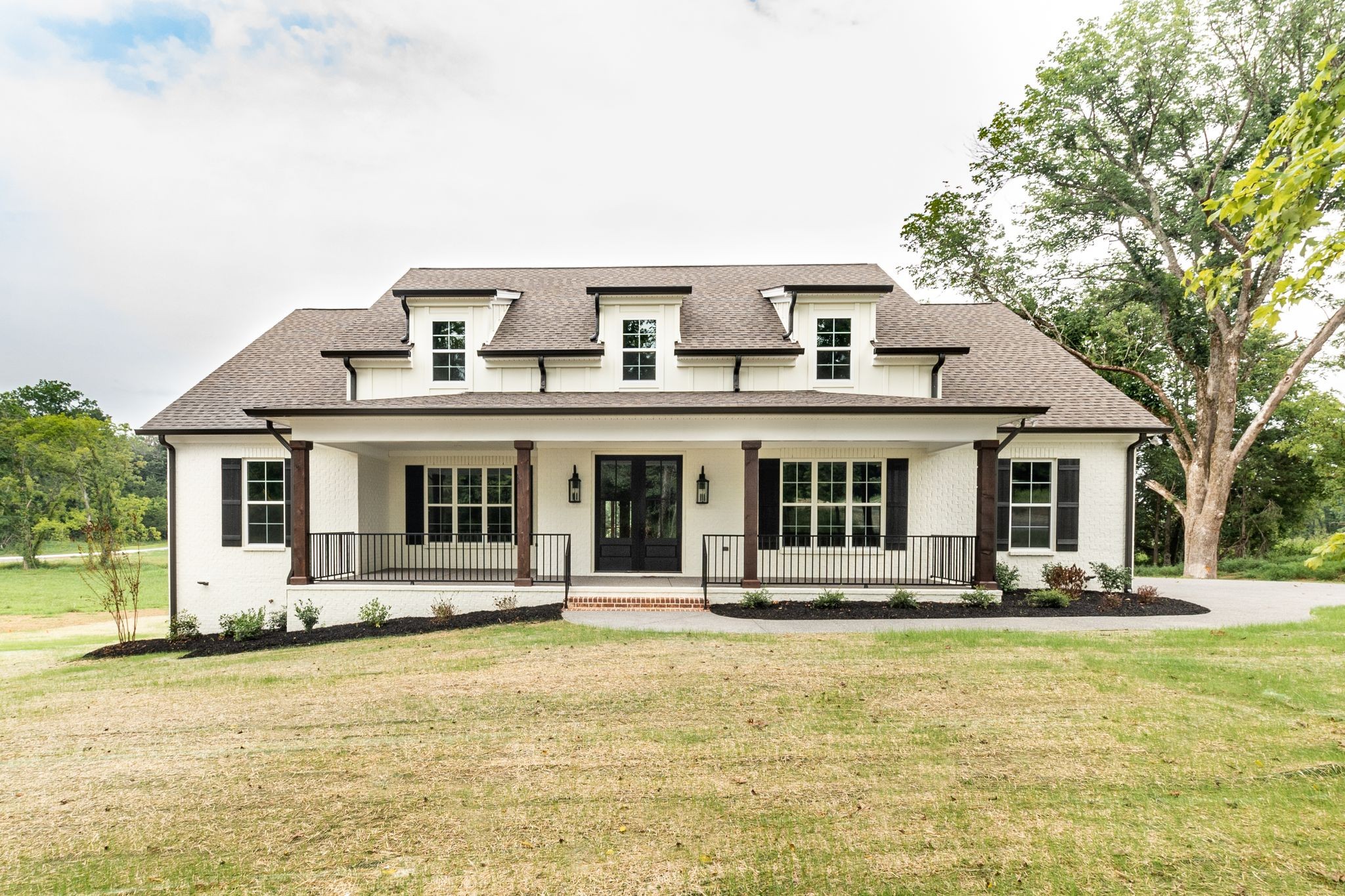1581 Phillips Road Lebanon, TN 37087 - Photo 1 of 36 a front view of a house with a yard