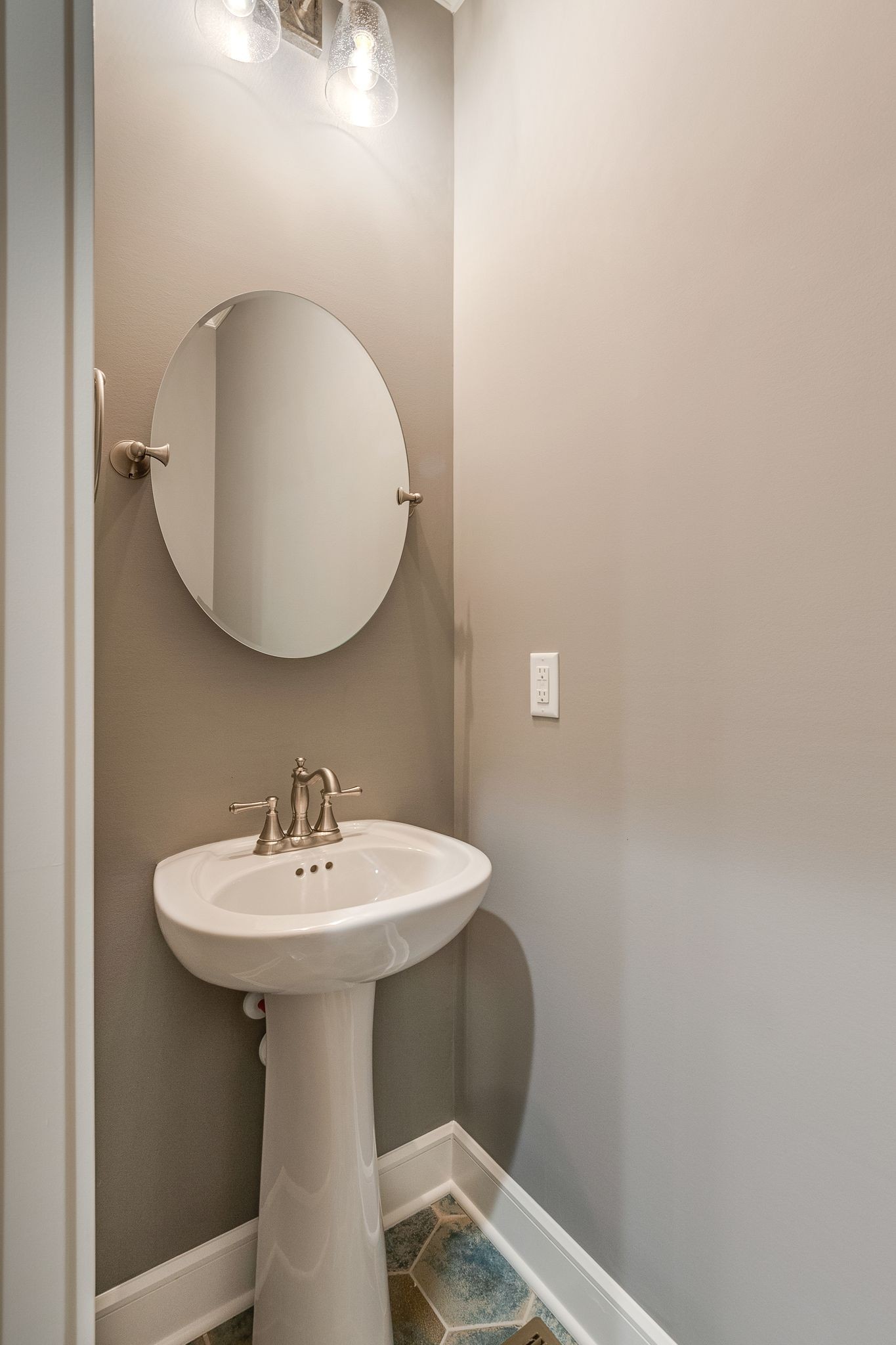 1581 Phillips Road Lebanon, TN 37087 - Photo 19 of 36 a bathroom with a sink and a mirror