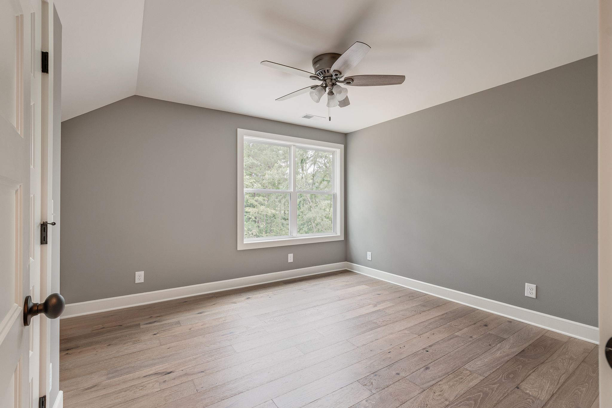 1581 Phillips Road Lebanon, TN 37087 - Photo 33 of 36 a view of an empty room with wooden floor and a window