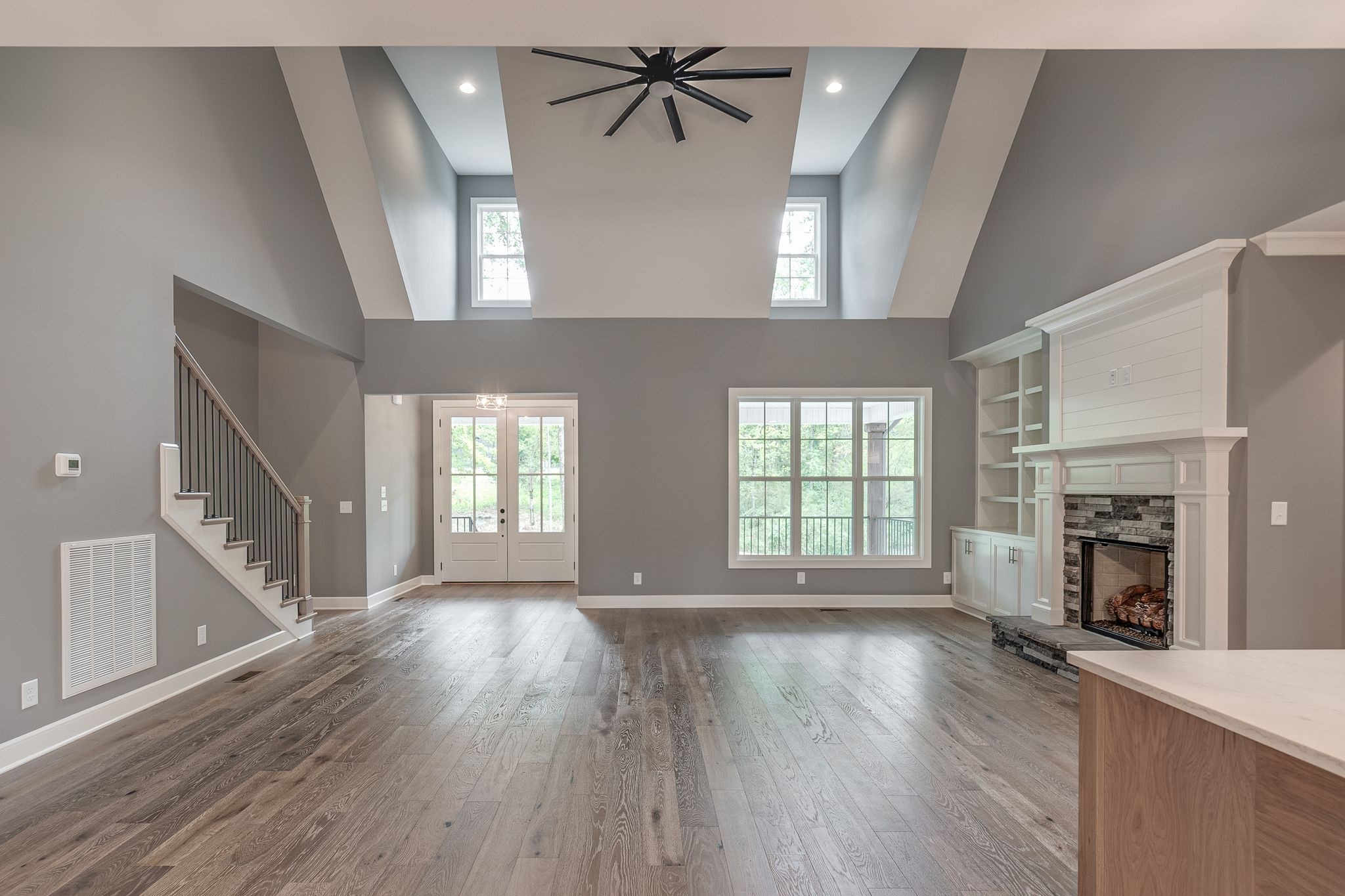 1581 Phillips Road Lebanon, TN 37087 - Photo 8 of 36 a view of empty room with wooden floor and fireplace
