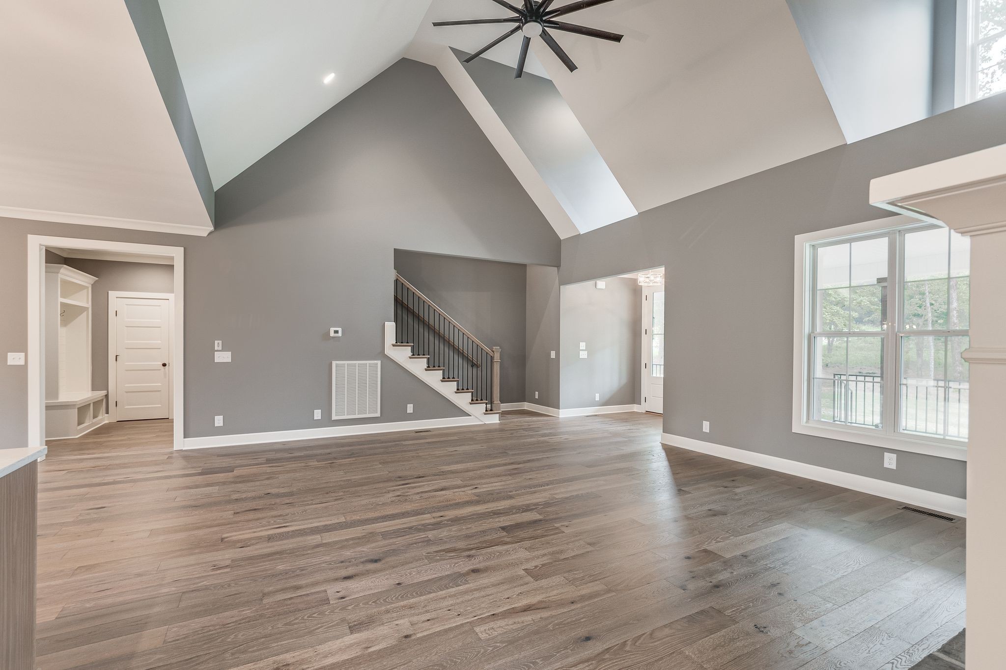 1581 Phillips Road Lebanon, TN 37087 - Photo 9 of 36 a view of an empty room with wooden floor and a window