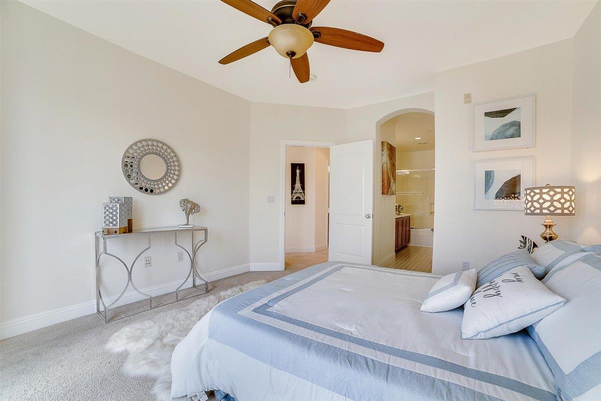 49030 Meadowfaire Common Fremont, CA 94539 - Photo 25 of 52 a bedroom with bed and window