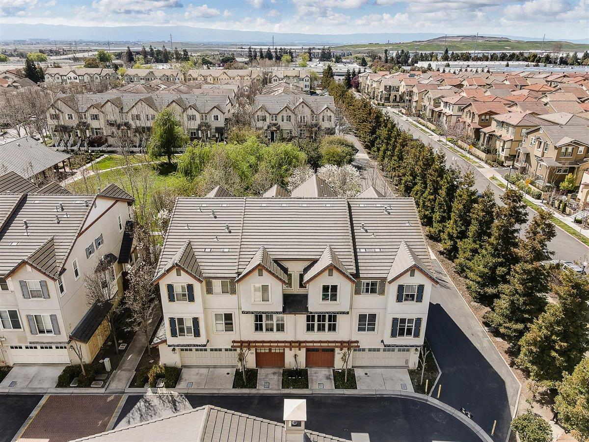 49030 Meadowfaire Common Fremont, CA 94539 - Photo 43 of 52 an aerial view of residential houses with outdoor space