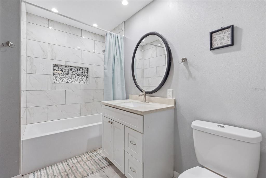 401 Southeast Falcon Road Branford, FL 32008 - Photo 36 of 76 a bathroom with a sink a toilet and a shower
