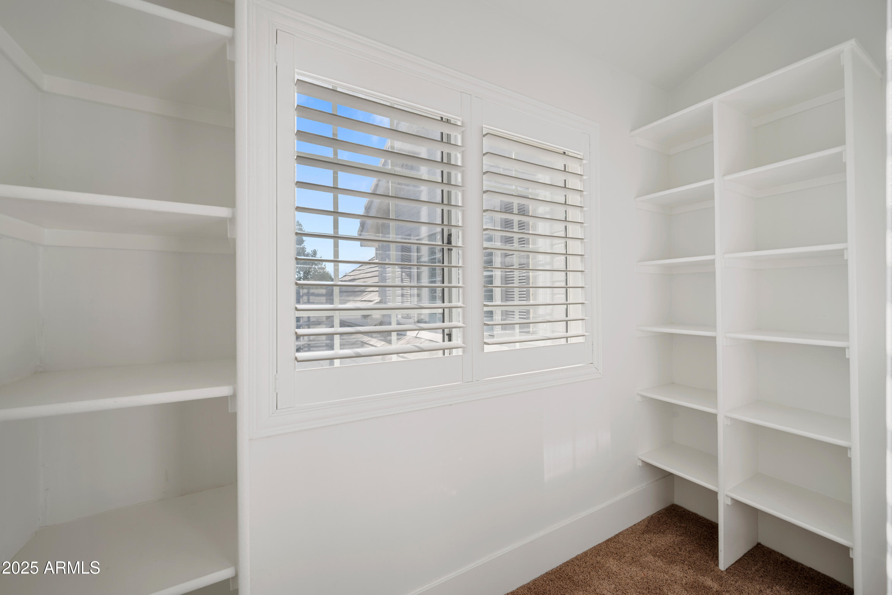 4352 East Santa Rosa Place Gilbert, AZ 85234 - Photo 36 of 53 a view of a room with empty racks