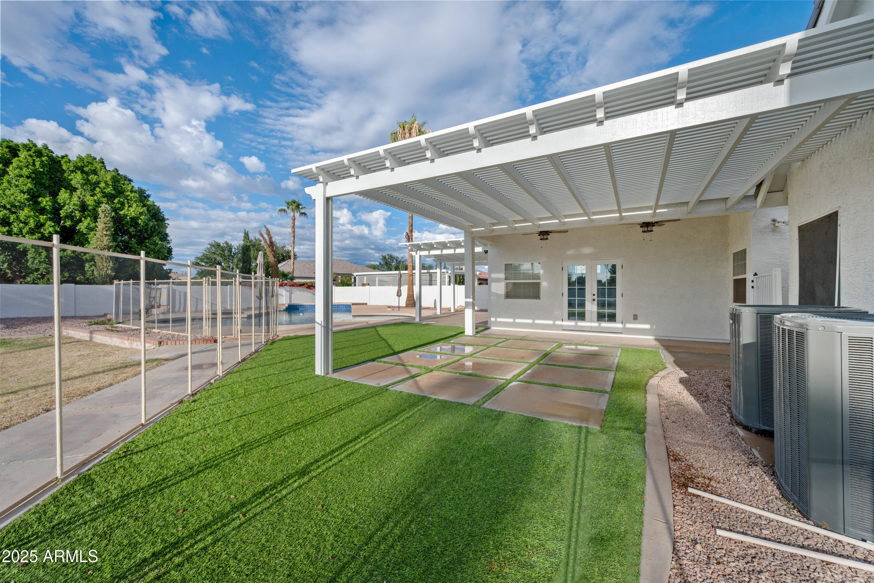 4352 East Santa Rosa Place Gilbert, AZ 85234 - Photo 47 of 53 a view of a backyard with trampoline