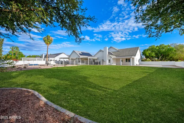 a view of a swimming pool with a terrace