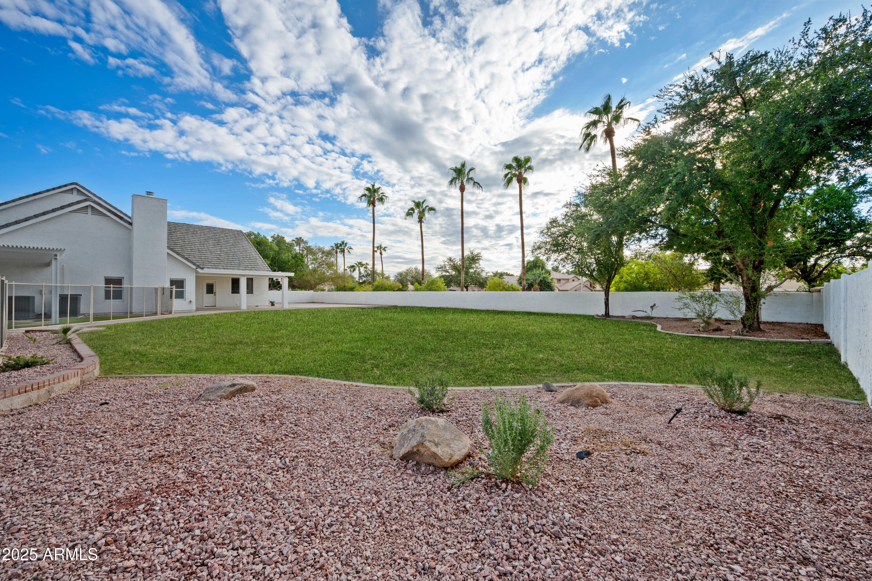 4352 East Santa Rosa Place Gilbert, AZ 85234 - Photo 51 of 53 a view of a house with a yard